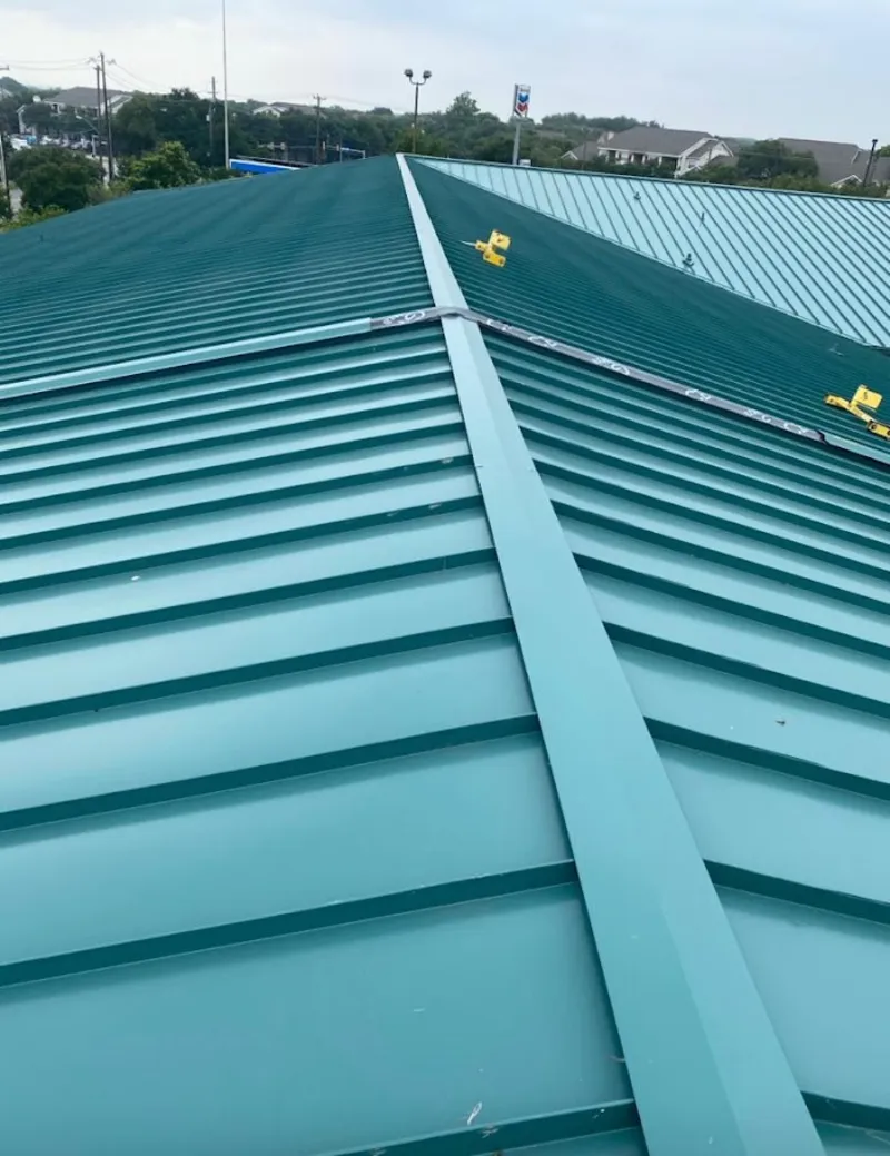 Green commercial metal roof ridge and valley for Metal Roof Repair in De Soto
