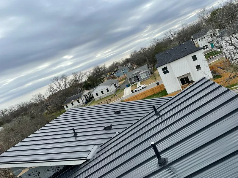 Standing seam metal roof panels with vents for Skylight Repair in De Soto